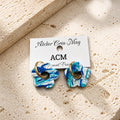 Boucles d’oreilles de la Collection Ciel et Mer Fleur.