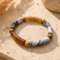 Bracelet homme ambre et gris marbré.