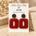 Boucles d’oreilles léopard rouge et noire.